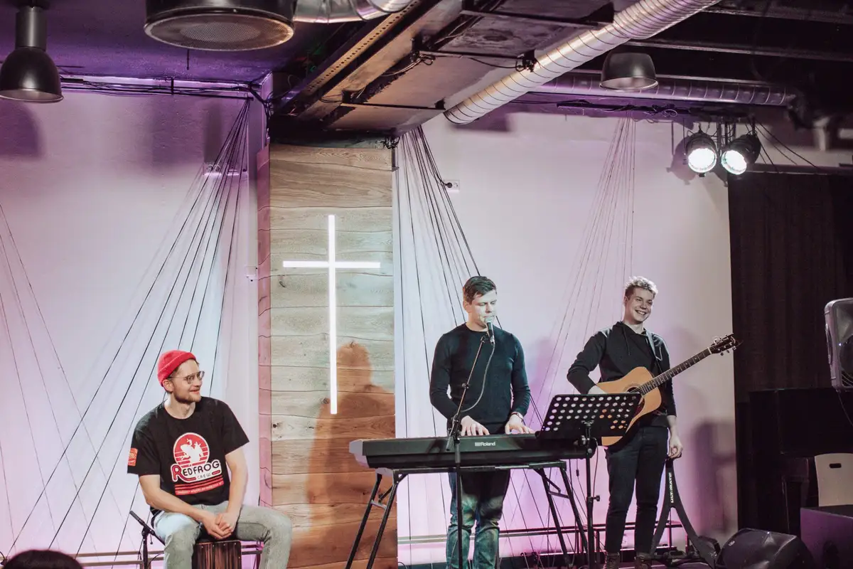 The band under the white cross